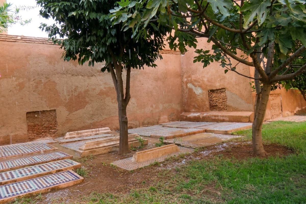 Garden tombs among trees in the outdoor burial court of the Saadian Tombs