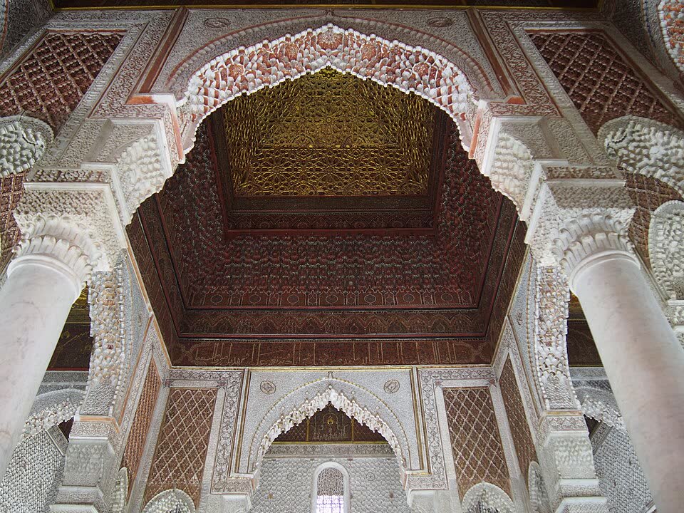 The Chamber of the Twelve Columns at the Saadian Tombs, Carrara marble columns beneath a gilded muqarnas ceiling